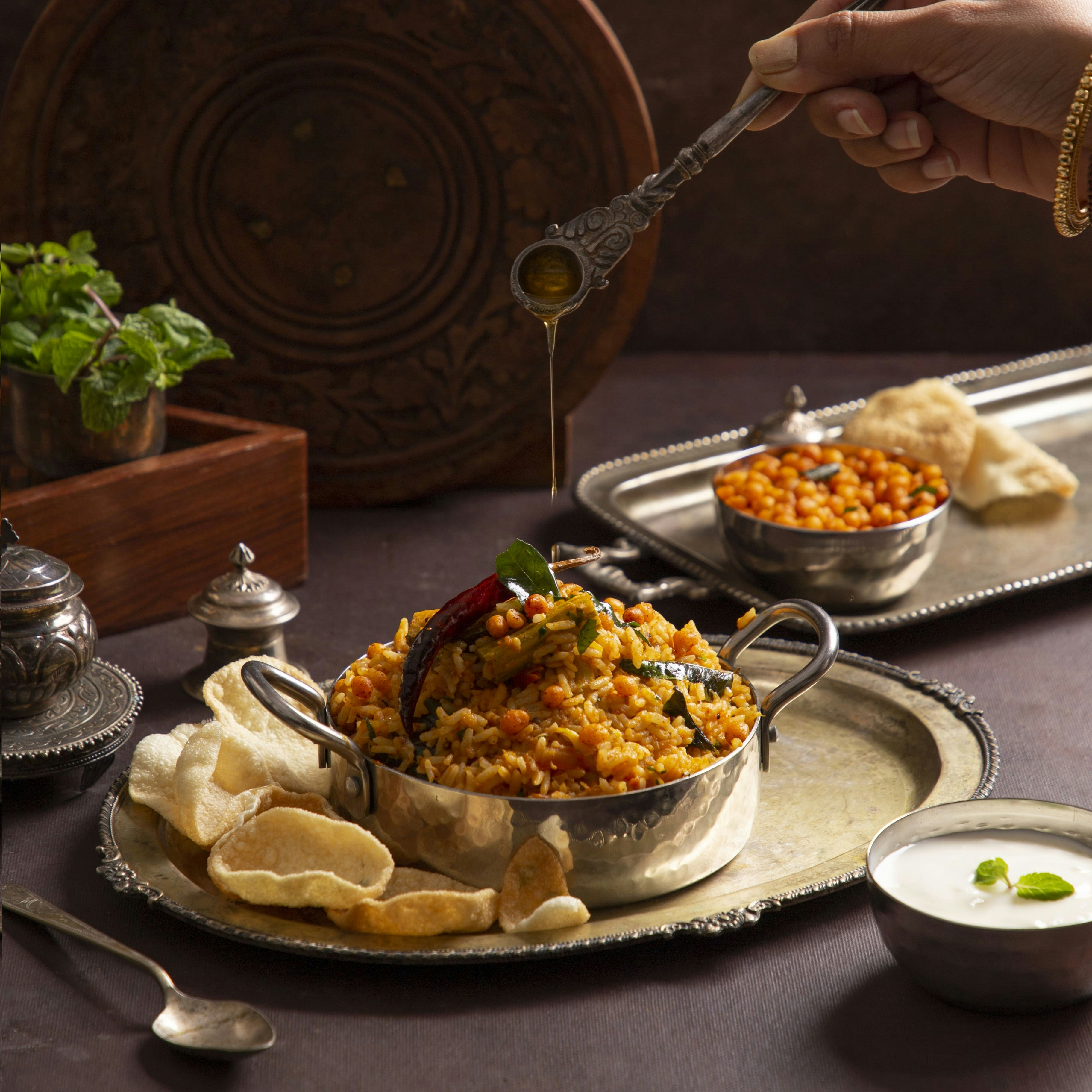 An artfully presented vegetarian dish, perhaps a vibrant roasted vegetable tart or a gourmet pasta.